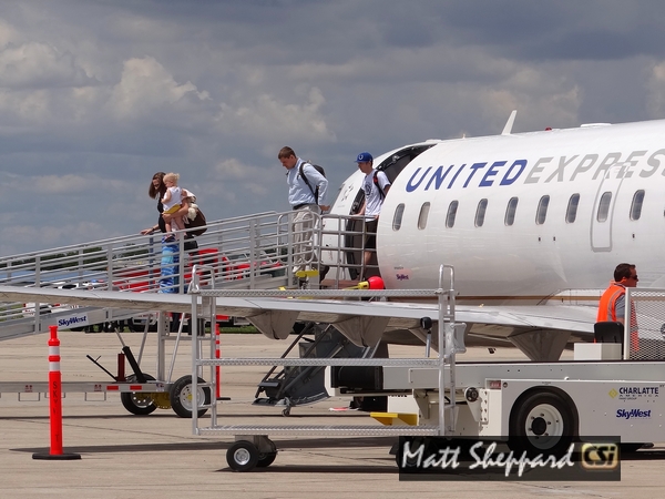Passengers arrive from Denver